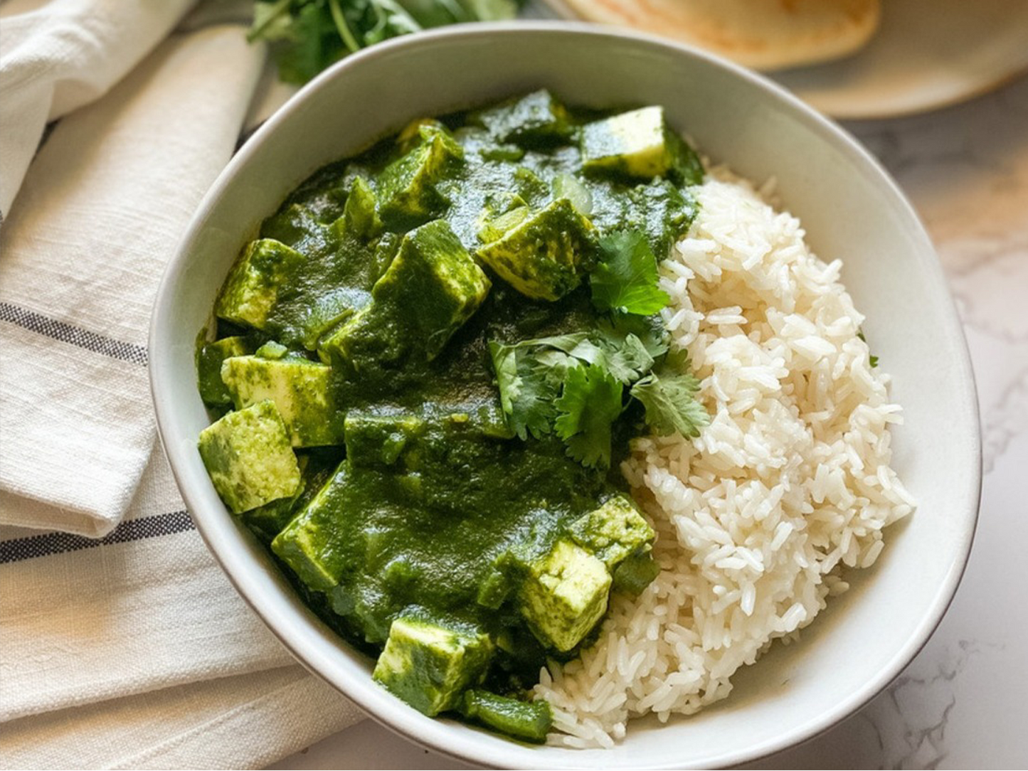 Palak Paneer-Cheese Cubes in Spinach over Rice